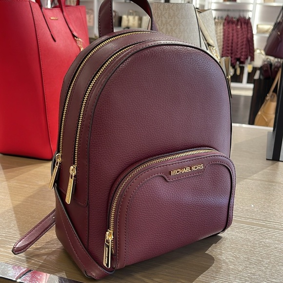 Michael Kors Handbags - Michael Kors Jaycee Medium Pebbled Leather Backpack
Oxblood/Golden NWT